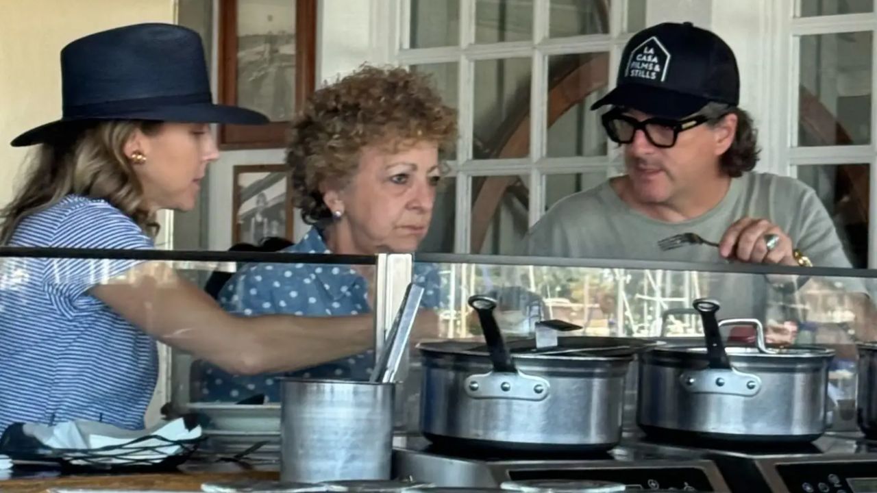 Kurt Iswarienko with his girlfriend Collier Grimm and his mother.