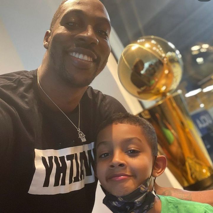 Dwight Howard with his youngest son David Howard.