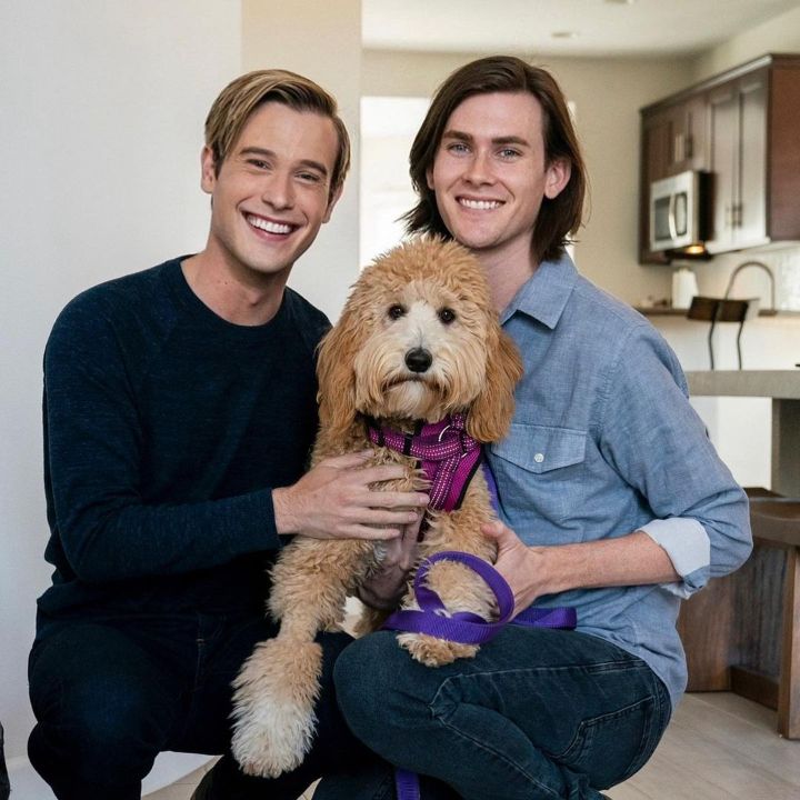 Tyler Henry and Clint Godwin with their beloved dog Nanci.