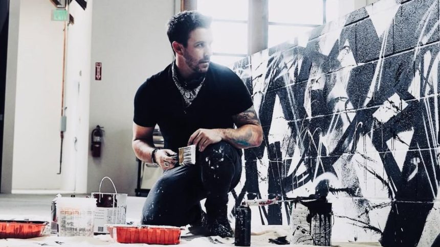 Nick from ‘The Ultimatum’ Season 3 performing graffiti art.