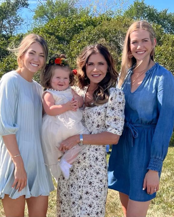 Kristi Noem with her daughters, Kassidy (right) and Kennedy (left), and her granddaughter, Adeline.