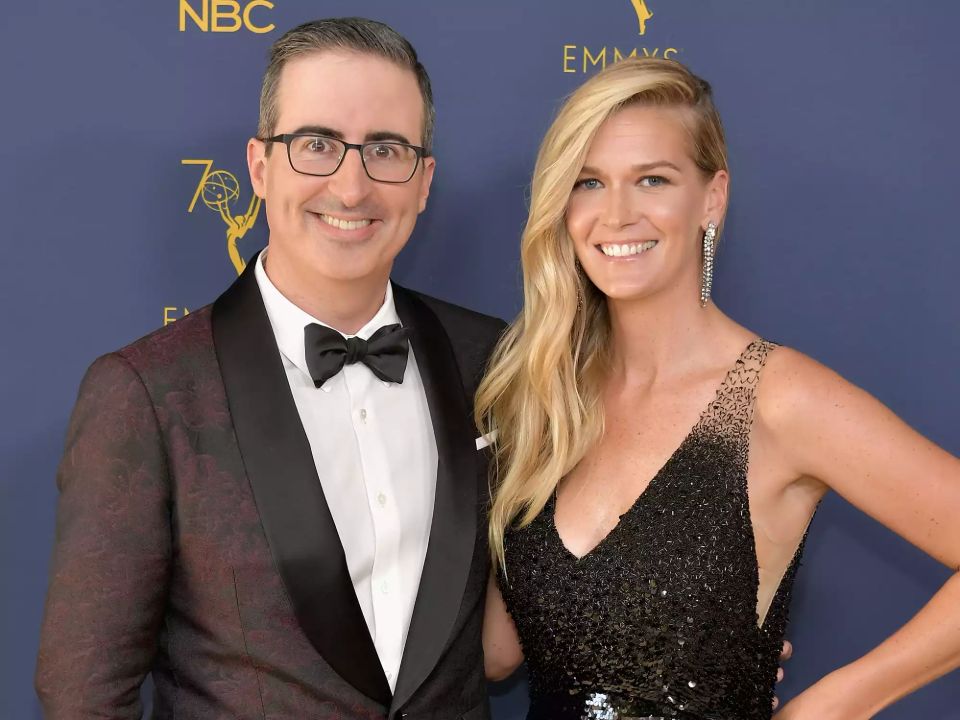 John Oliver with his wife, Kate Norley.