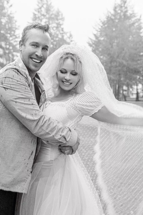 Pamela Anderson with her husband, Dan Hayhurst.