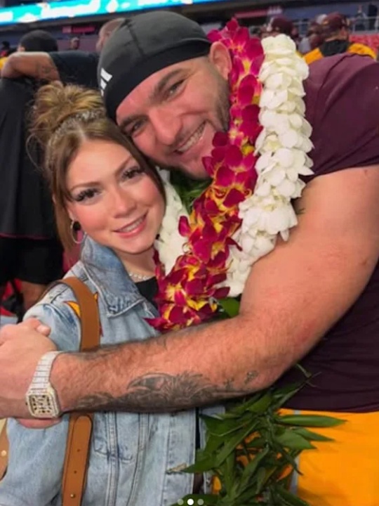 Cam Skattebo with his girlfriend, Chloe Rodriguez.