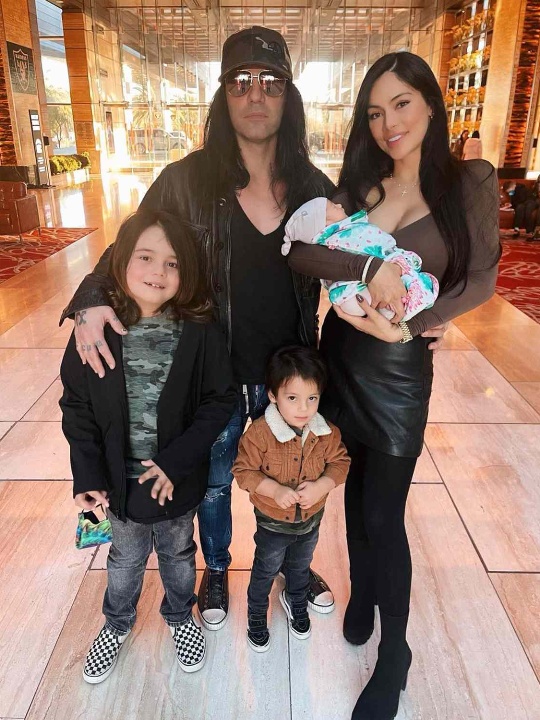 Criss Angel with his wife and kids.