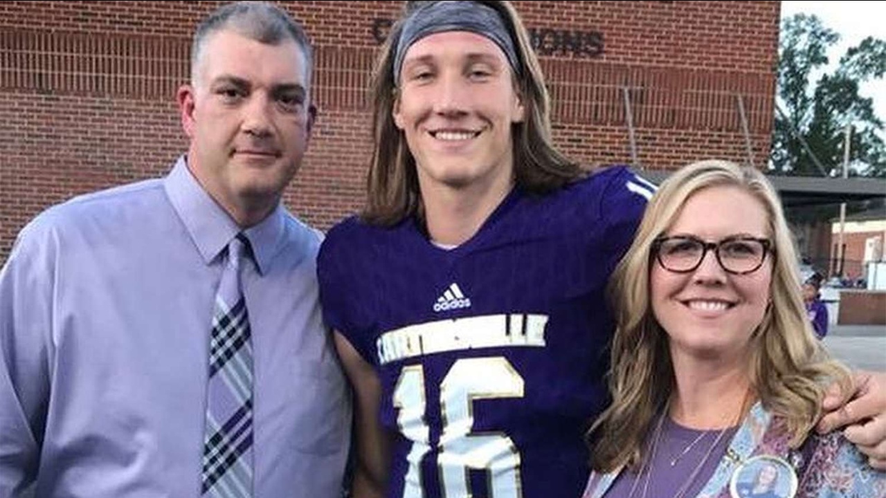 Trevor Lawrence with his parents.