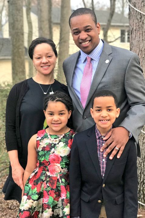 Justin Fairfax with his wife and kids.