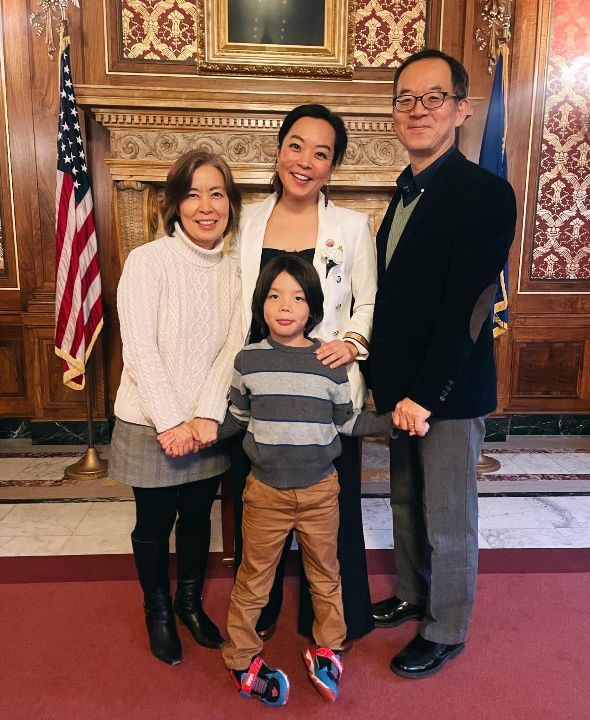 Francesca Hong with her parents and son.