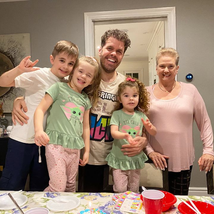 Perez Hilton with his mother and kids.